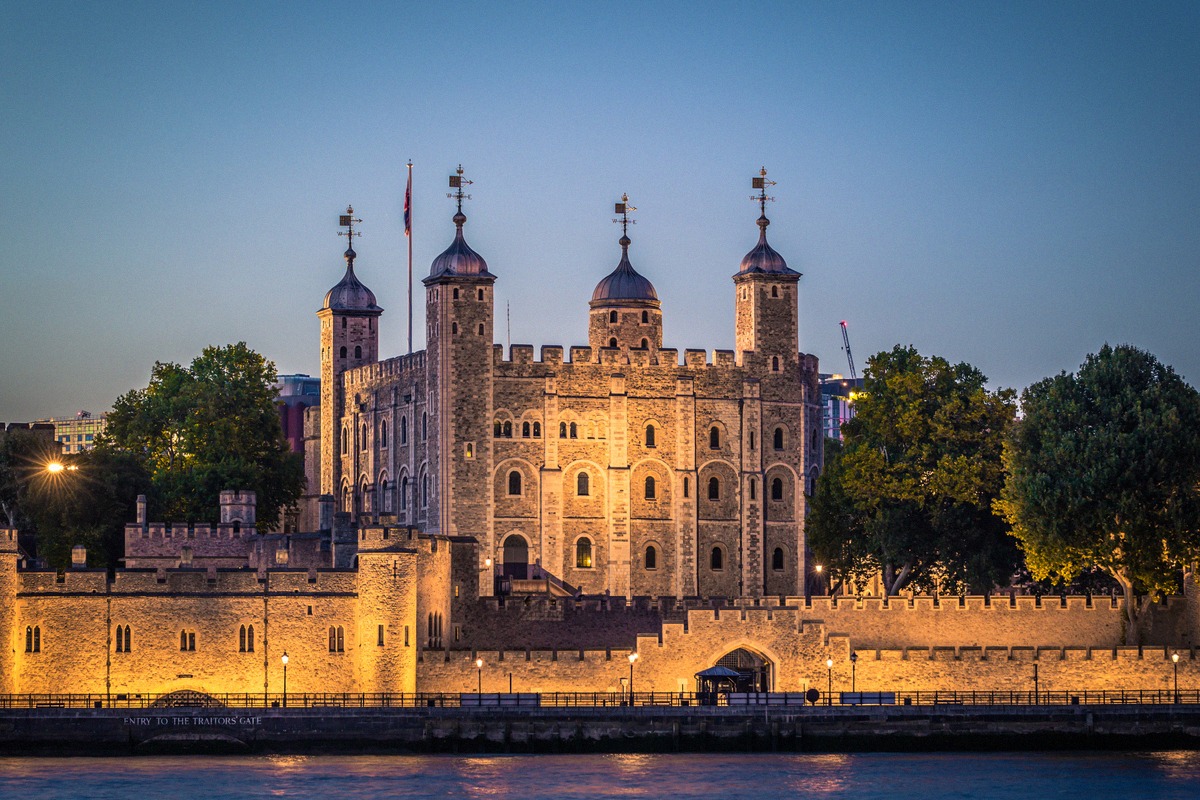 The Tower of London on the Thames in the blue evening light