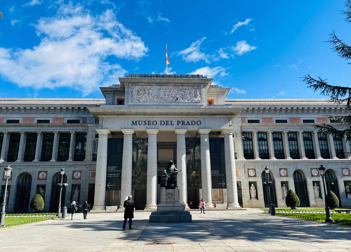 Columned facade of the Museo del Prado in Madrid with the Velazquez monument